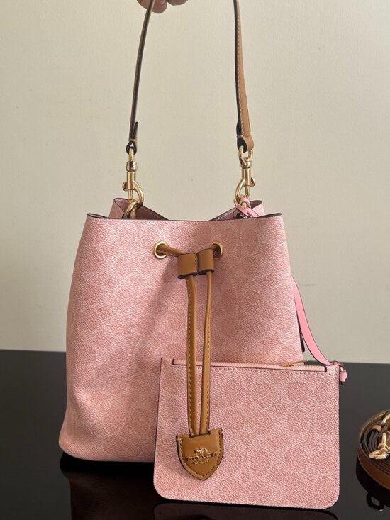 Coach Handbags - Coach Pink Monogram Drawstring Bucket Bag